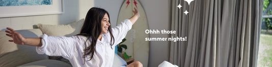 Beach inspired bedroom with 'Ohhh those summer nights!' text